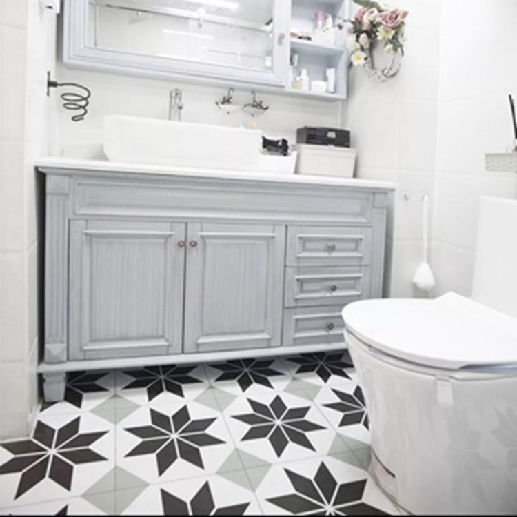 black and white ceramic tile bathroom